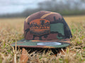 SAHC Green camo/black classic 5 panel trucker hat